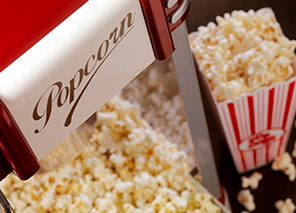 Movie theater popcorn representing entertainment, games, and community room activities at Moose Lake Village.