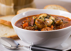 Bowl of hearty soup representing restaurant-style dining at Moose Lake Village in Moose Lake, Minnesota.