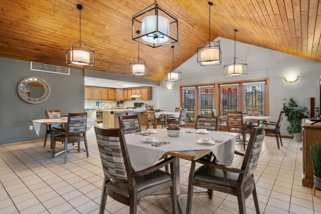 Dining room with restaurant-style seating at Kenwood Assisted Living in Moose Lake, Minnesota.